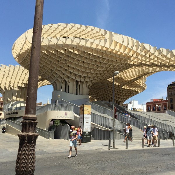 "Metropol Parasol is a wooden structure located at La Encarnación square, in the old quarter of Seville, Spain. ... The structure consists of six parasols in the form of giant mushrooms"