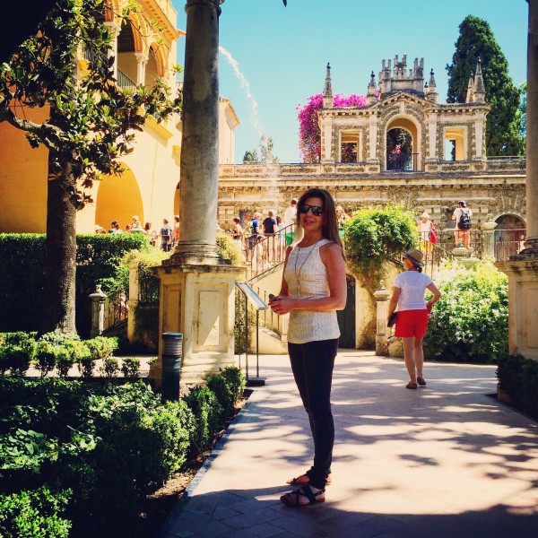 Walking toward on of the gardens - Reales Alcázares de Sevilla" or "Royal Alcazars 